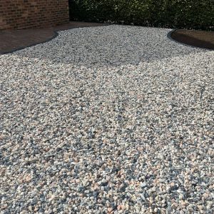Decorative gravel driveway β building work by Fen Developments