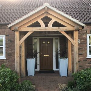 Oak-framed porch over front door β building by Fen Developments