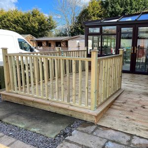 Raised timber decking with balustrade β building work by Fen Developments