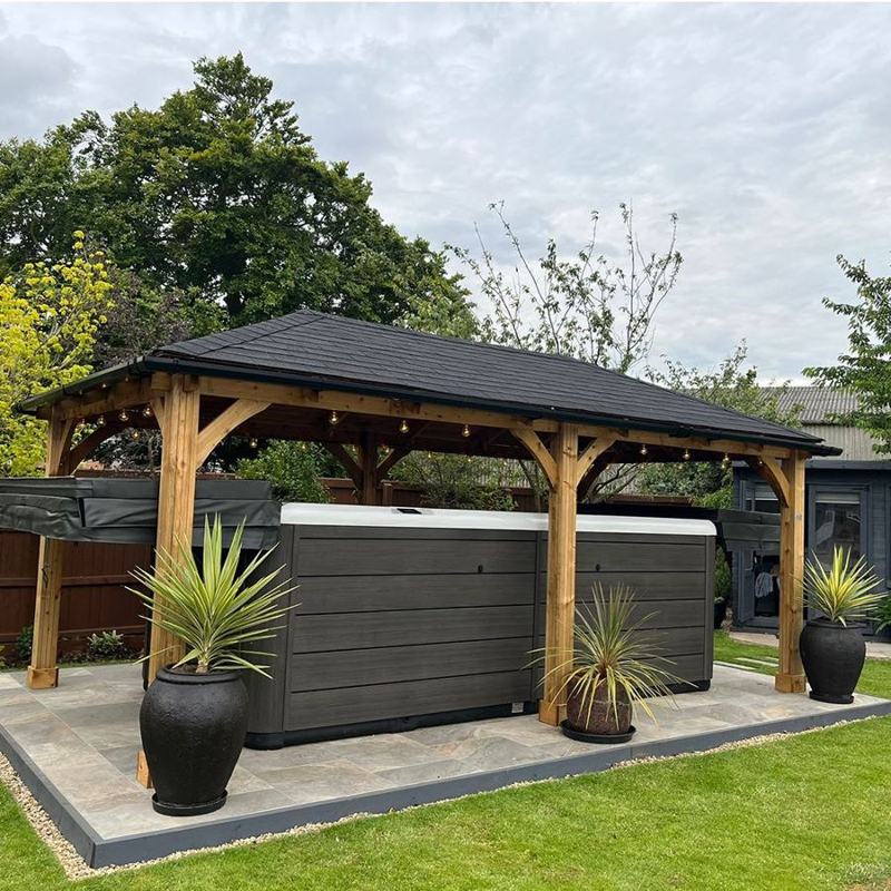 Garden building with gazebo by Fen Developments